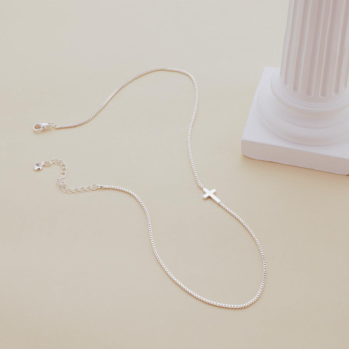 Holding Cross necklace