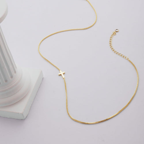 Holding Cross necklace