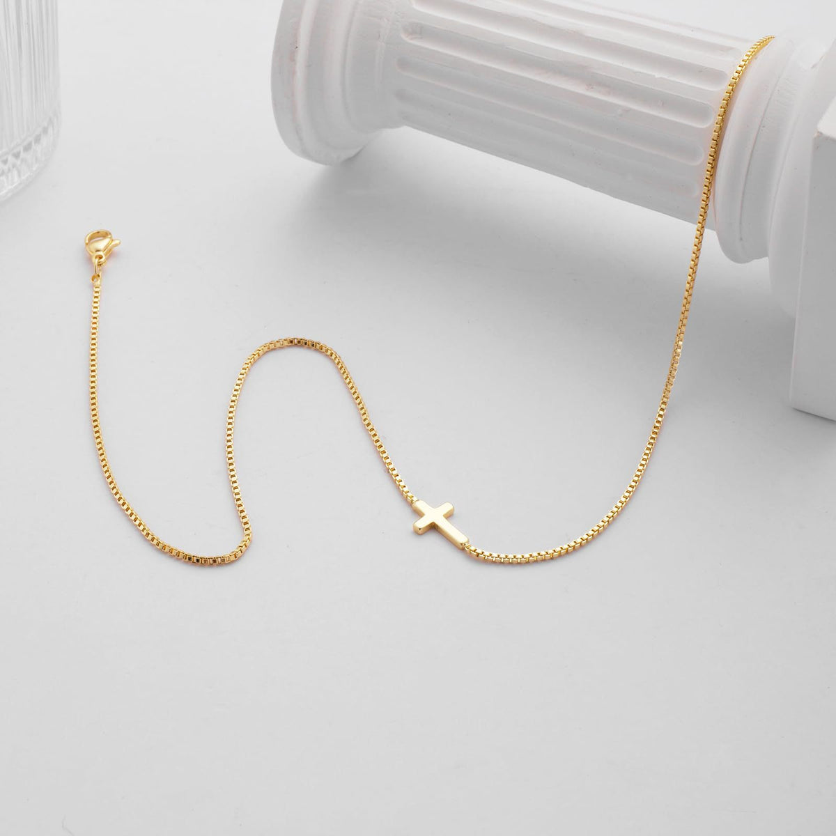Holding Cross necklace